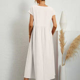 Gabrielle — Vestido Fluido com Elegância Atemporal